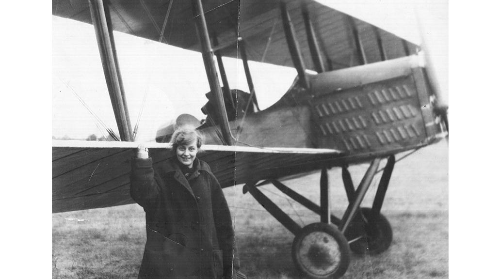 woman by plane